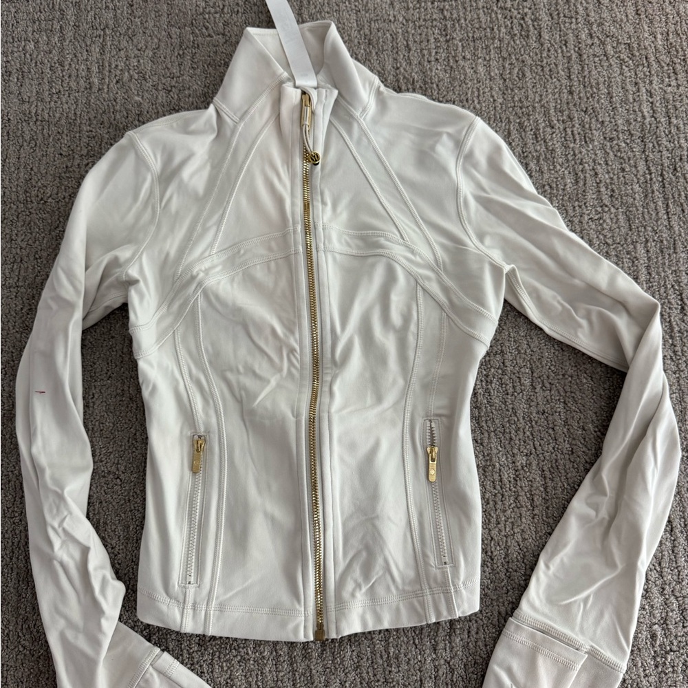 Lululemon Athletica White Leather Jacket with Gold Zipper. Never worn